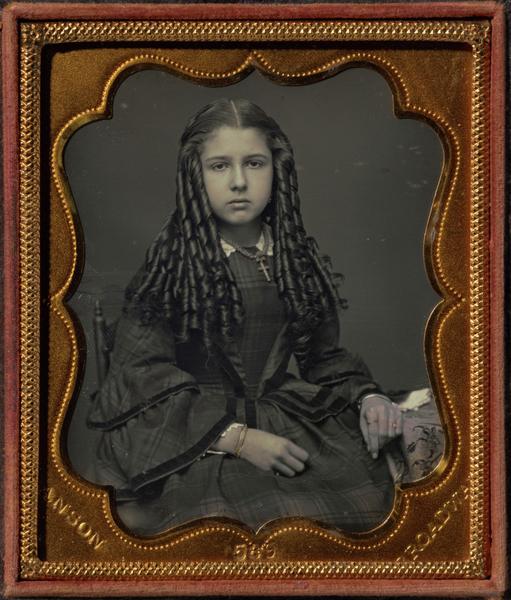 Teenage girl with bottle curls