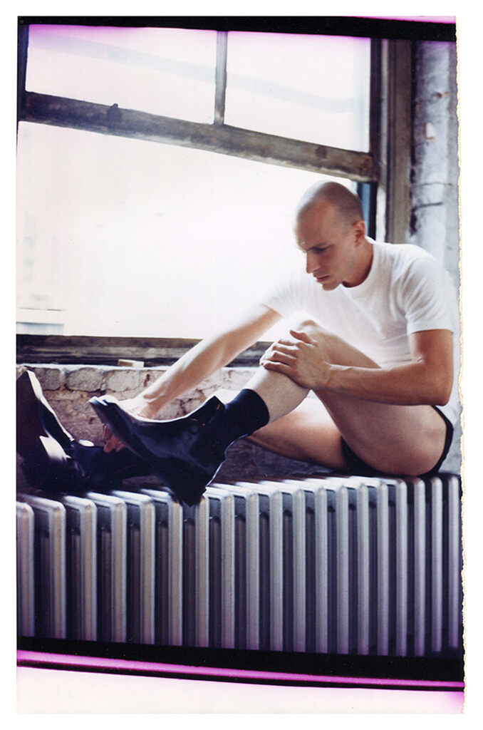 Jack Pierson — Untitled (Russ C. on Radiator with Boots/Matsuda Shoot), 1997