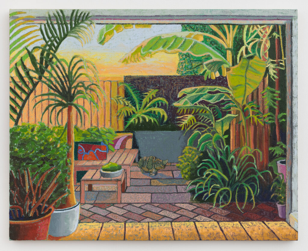Caribbean Patio Garden with Ancient Rhino Sculpture
