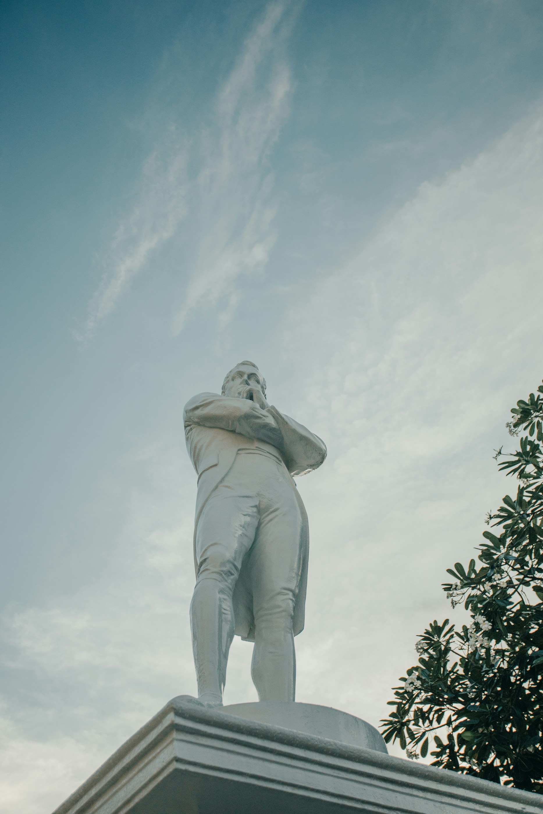Thomas Woolner (after); cast 1972 — Statue of Stamford Raffles (white polymarble cast)